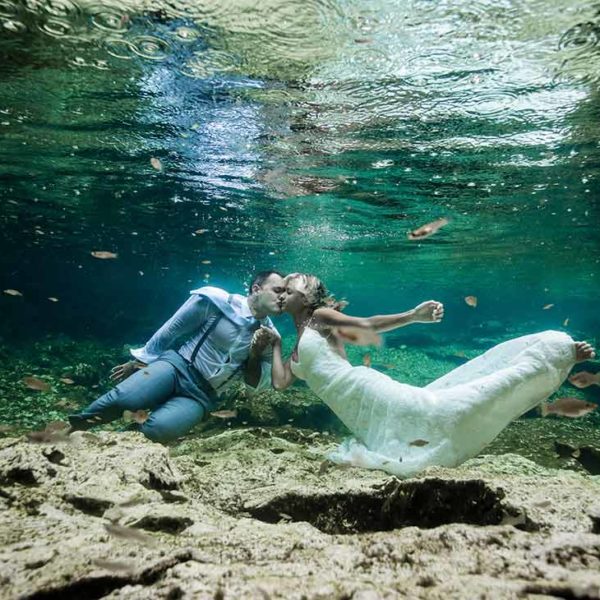 trash the dress in cenotes cancun wedding photography