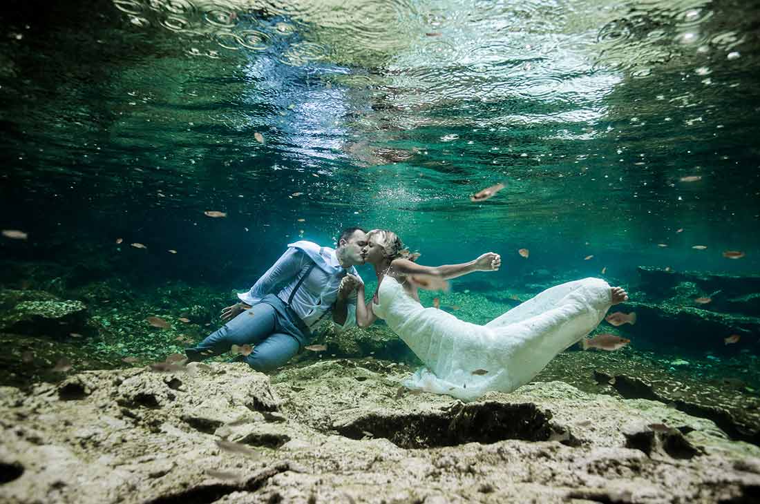 trash the dress in cenotes cancun wedding photography